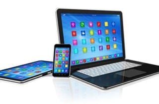 Laptop, phone and tablet with apps
