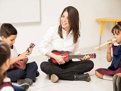 Preschoolers having music lesson