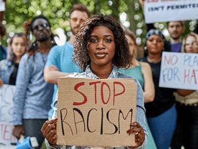 Confronting Racism Through Courageous Conversations in the Secondary Classroom