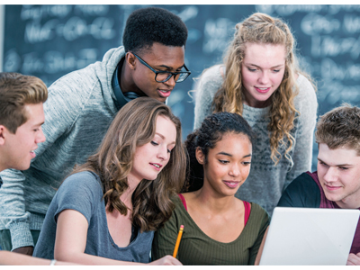 Students using a computer.