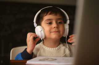 A child wearing headphones