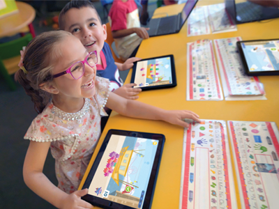 Children learning with tablets