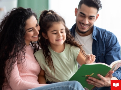 Two adults and a child reading